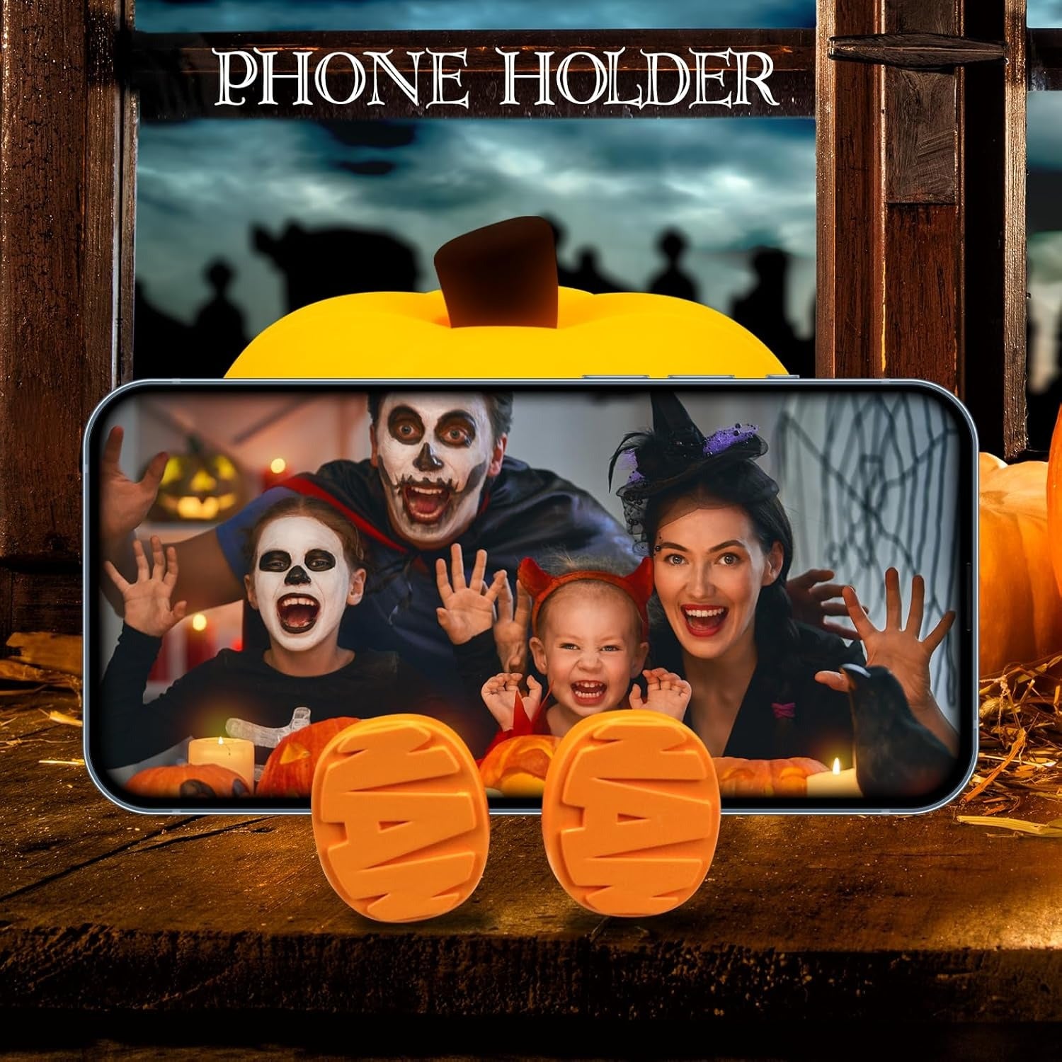Phone holder with Halloween-themed design featuring pumpkins